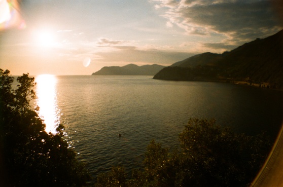 Sunset over Manarola, Cinque Terre, Italy shot on 35mm film using a lomography La Sardina camera